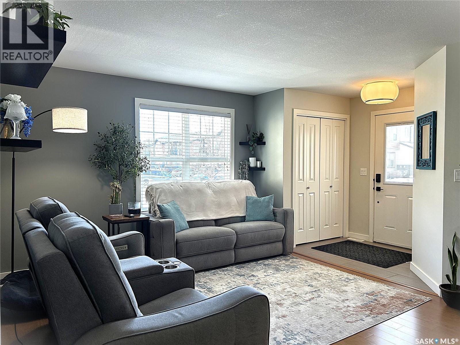 1603 1015 Patrick Crescent, Saskatoon, SK - Indoor Photo Showing Living Room