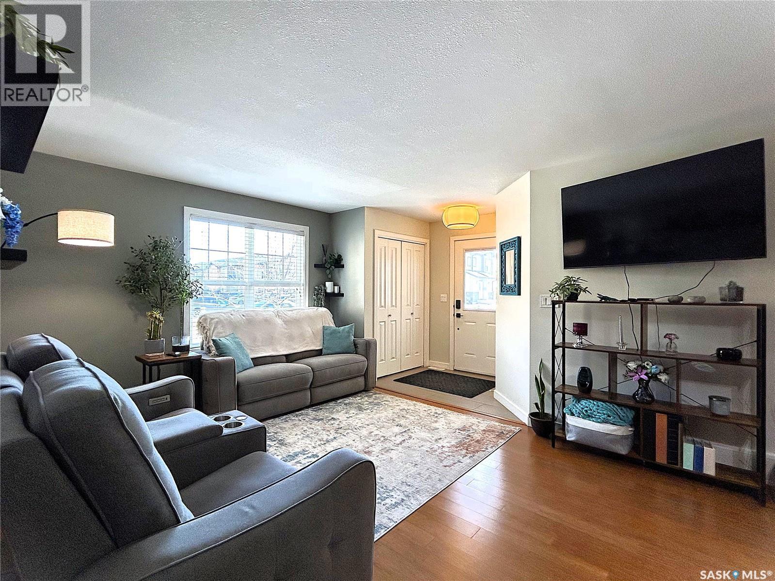 1603 1015 Patrick Crescent, Saskatoon, SK - Indoor Photo Showing Living Room