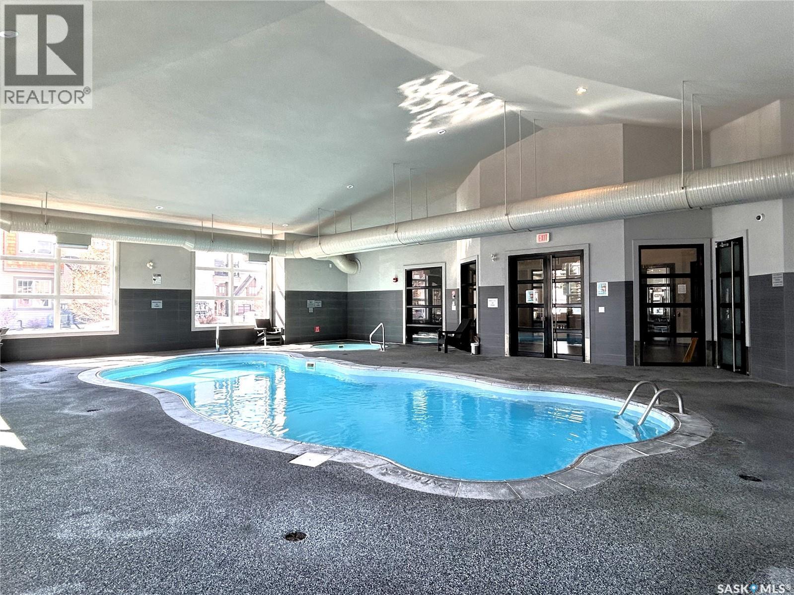 1603 1015 Patrick Crescent, Saskatoon, SK - Indoor Photo Showing Other Room With In Ground Pool