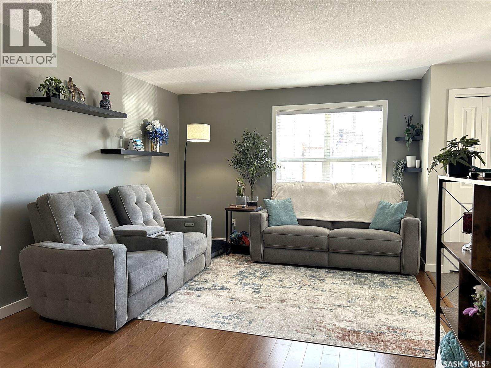 1603 1015 Patrick Crescent, Saskatoon, SK - Indoor Photo Showing Living Room