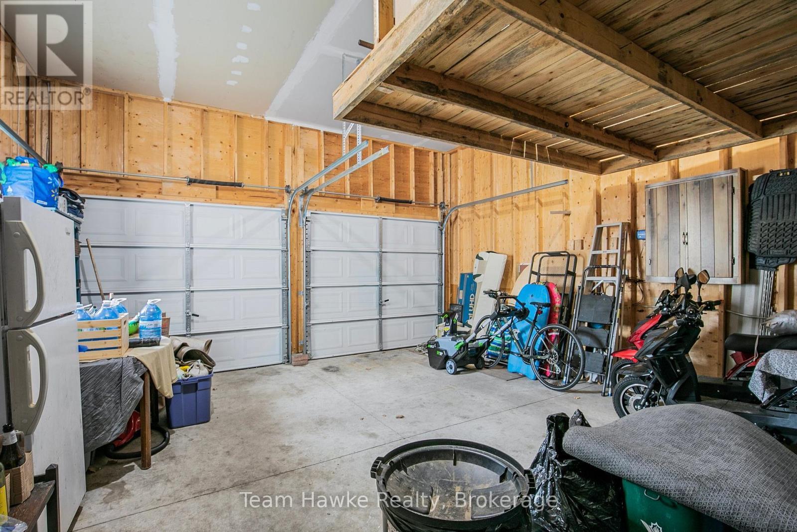 22 Laurier Boulevard, Tiny, ON - Indoor Photo Showing Garage