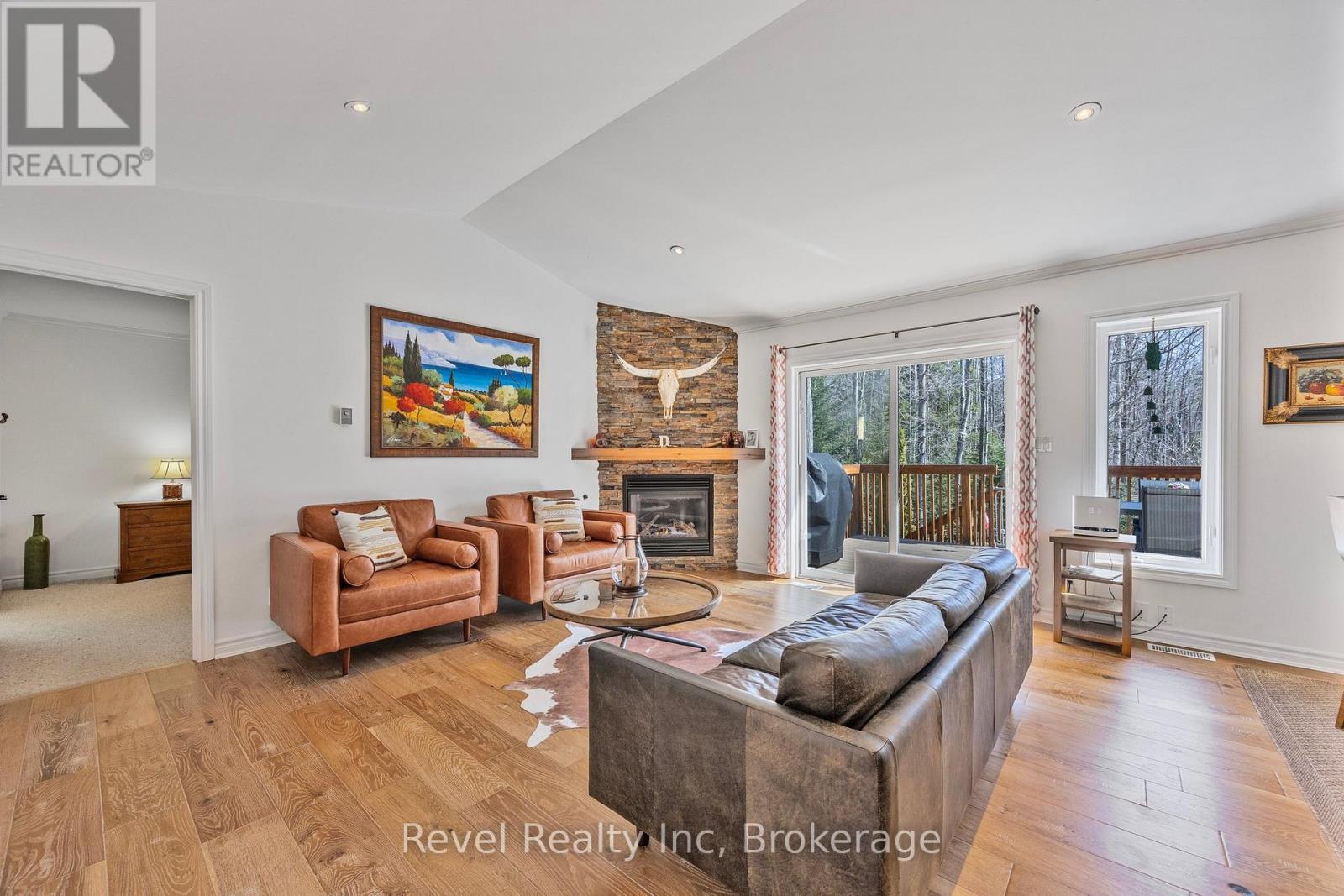 89 Trout Lane, Tiny, ON - Indoor Photo Showing Living Room With Fireplace
