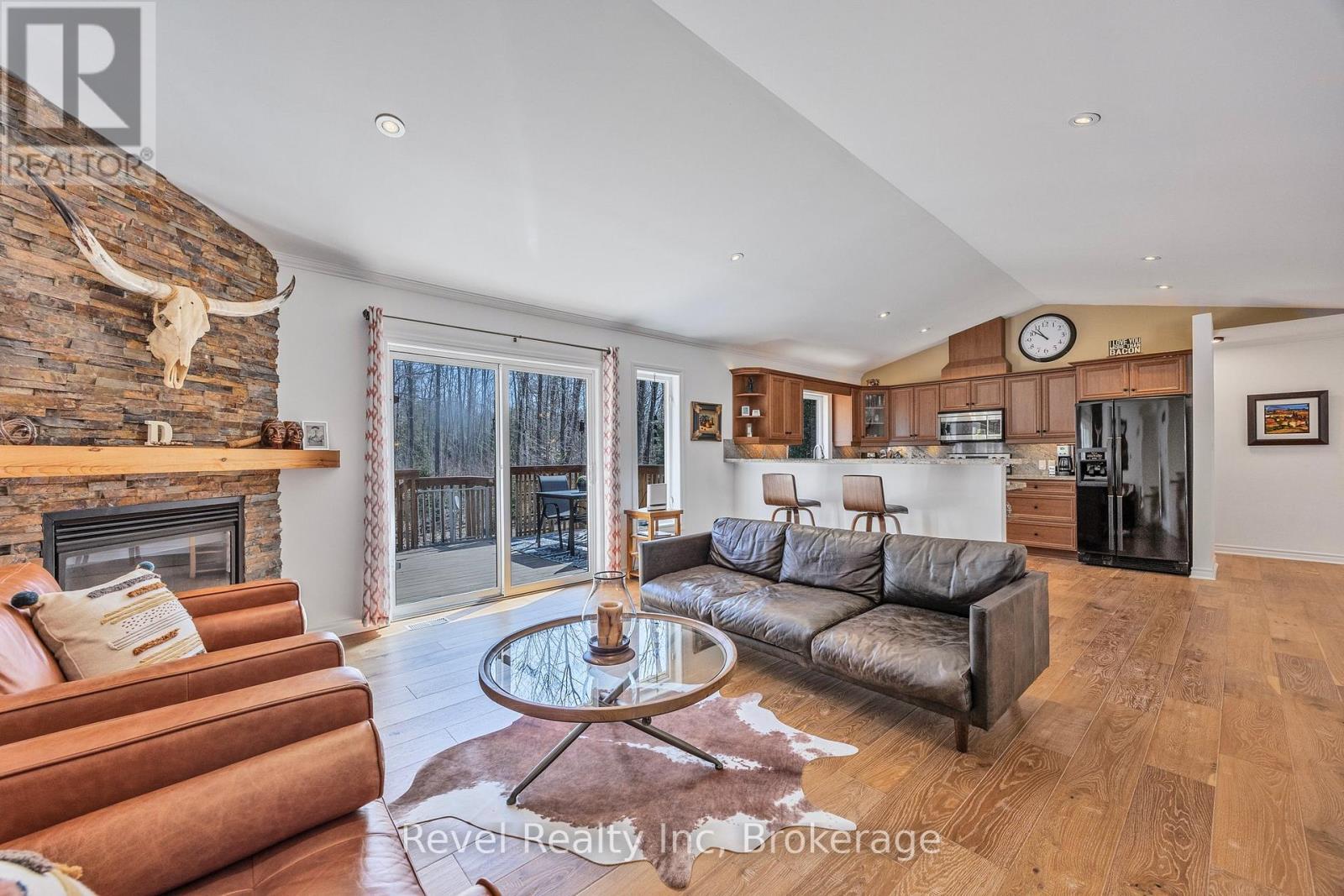 89 Trout Lane, Tiny, ON - Indoor Photo Showing Living Room With Fireplace
