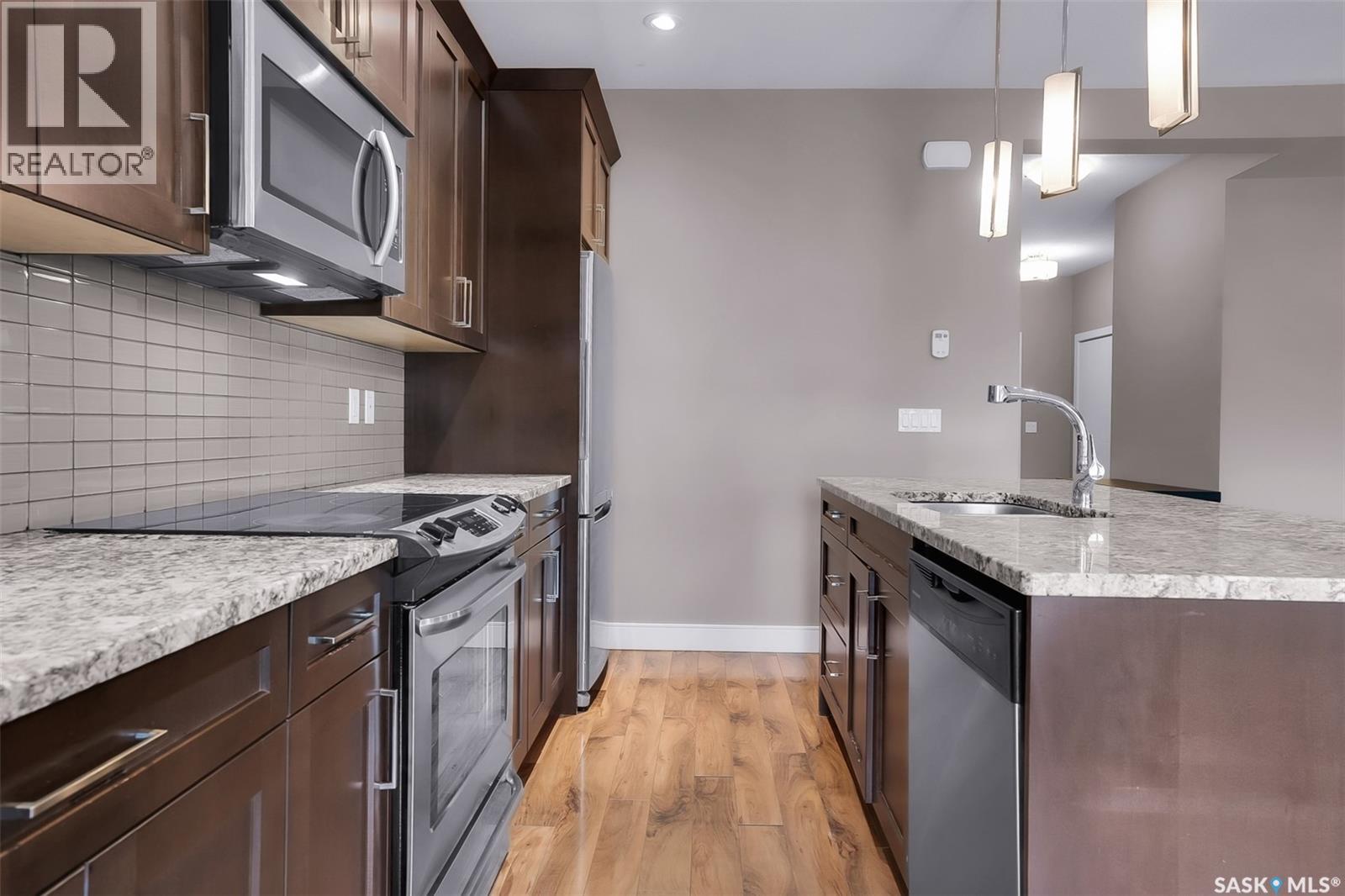 48 1550 Paton Crescent, Saskatoon, SK - Indoor Photo Showing Kitchen With Upgraded Kitchen