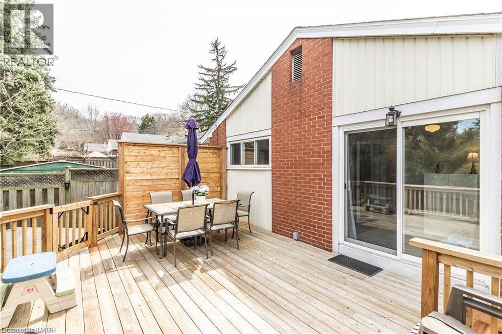 Wooden terrace featuring outdoor dining space - 11 Carwyn Crescent, Hamilton, ON - Outdoor With Deck Patio Veranda With Exterior