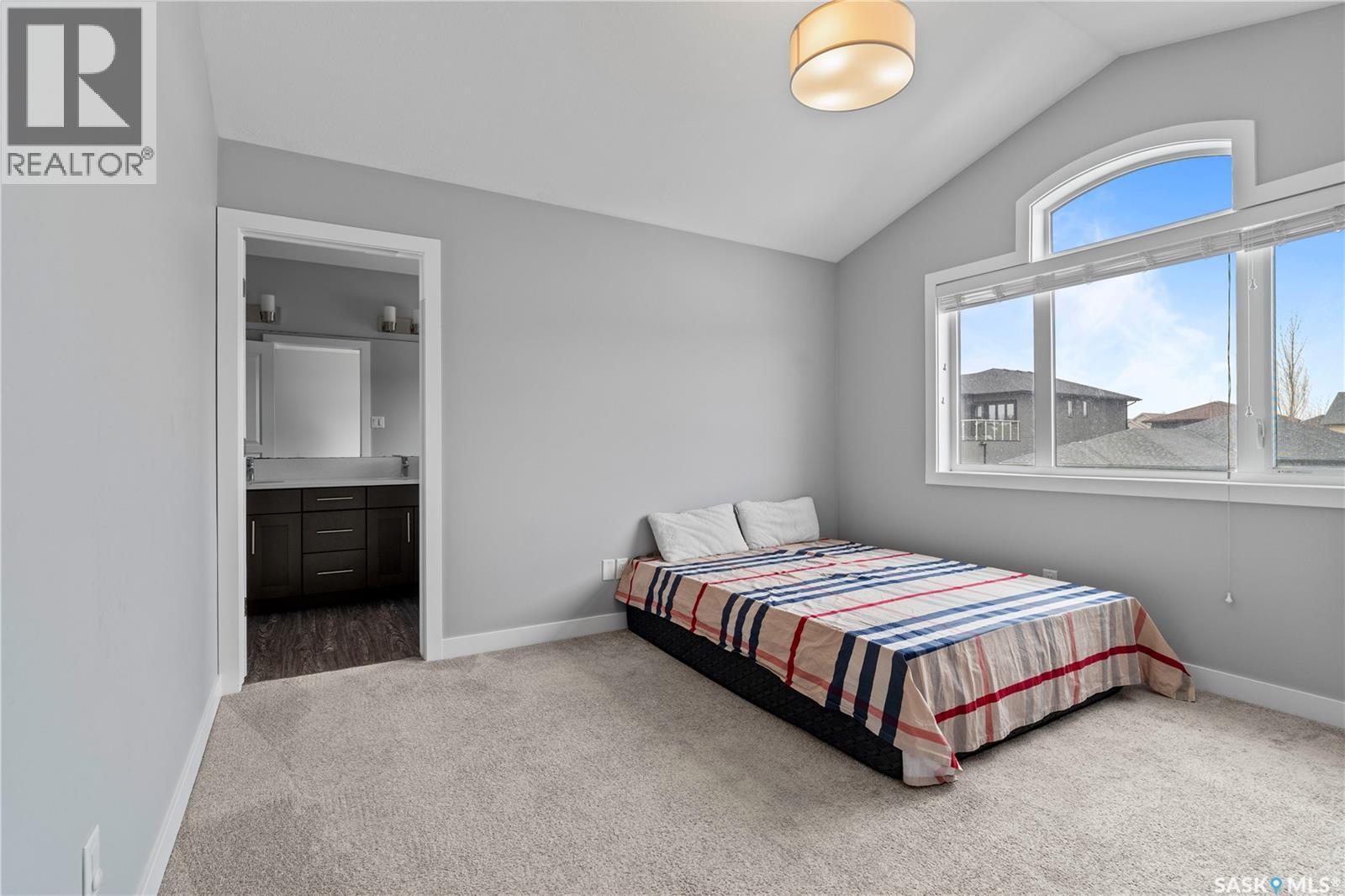 4810 Green Brooks Way E, Regina, SK - Indoor Photo Showing Bedroom