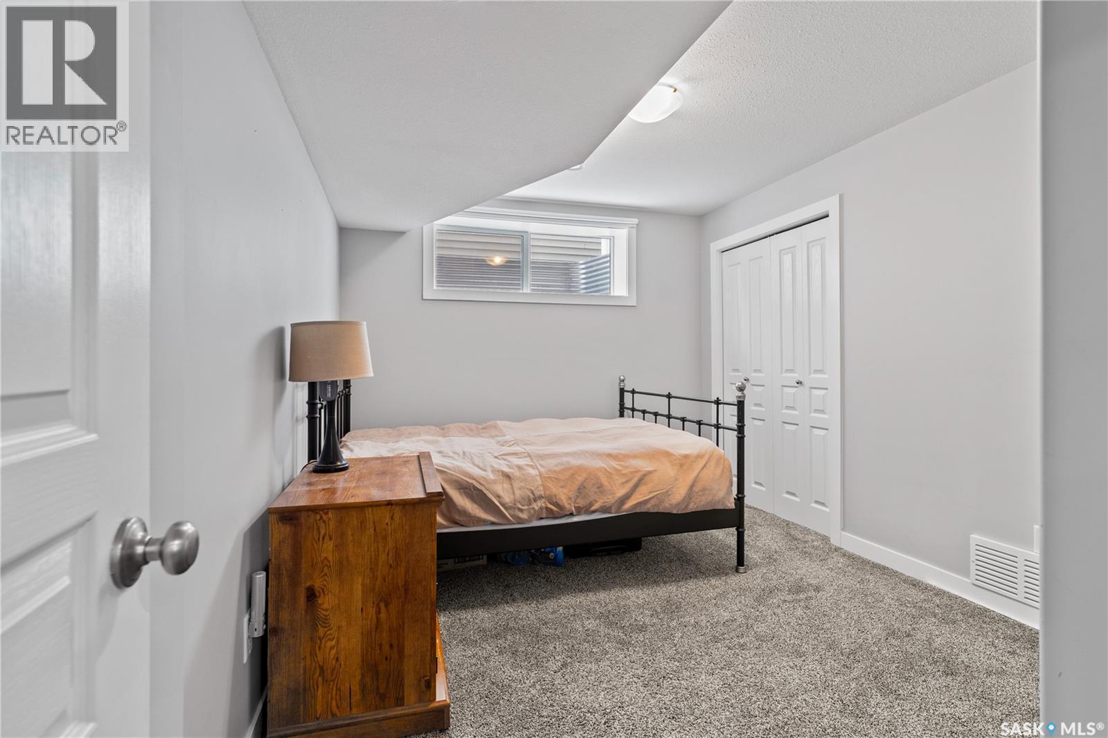 4810 Green Brooks Way E, Regina, SK - Indoor Photo Showing Bedroom