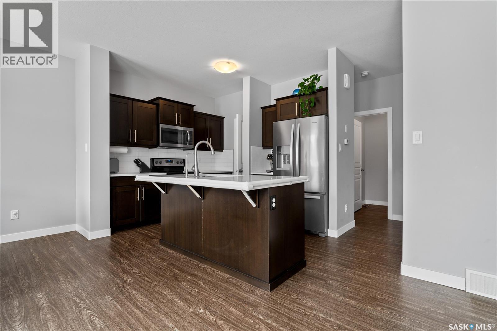 4810 Green Brooks Way E, Regina, SK - Indoor Photo Showing Kitchen With Stainless Steel Kitchen With Upgraded Kitchen
