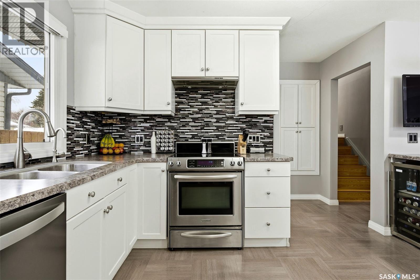 108 Matheson Crescent, Regina, SK - Indoor Photo Showing Kitchen With Double Sink