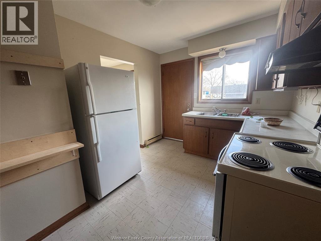 3027 Walker Road Unit# C, Windsor, ON - Indoor Photo Showing Kitchen With Double Sink
