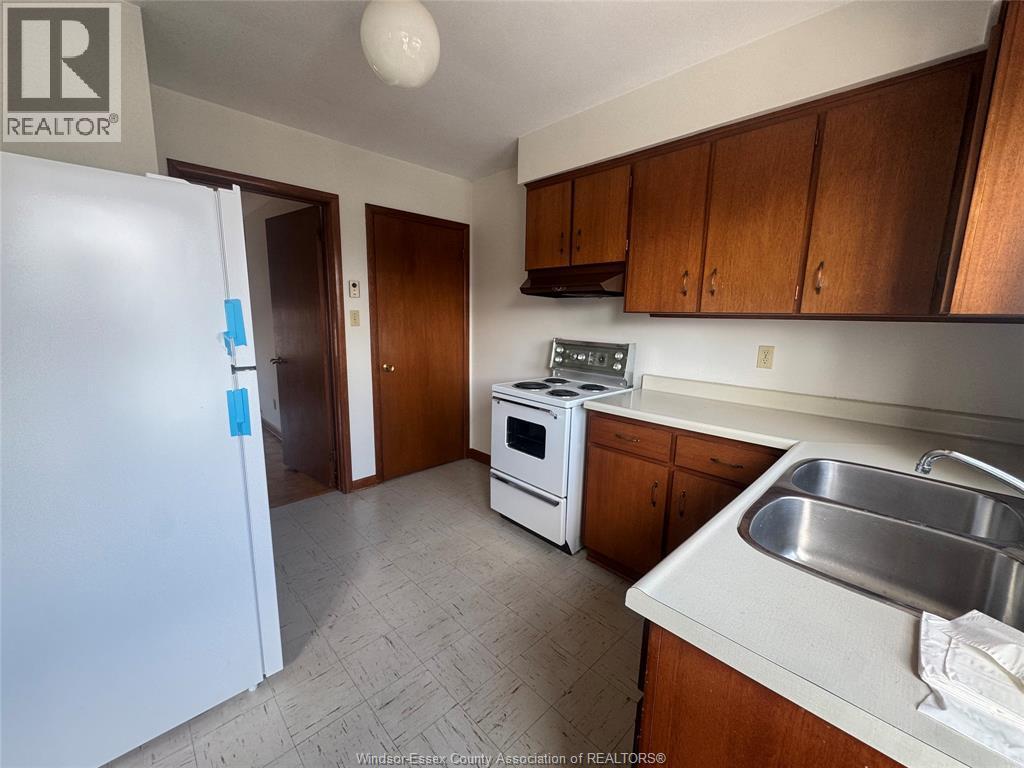 3027 Walker Road Unit# B, Windsor, ON - Indoor Photo Showing Kitchen With Double Sink
