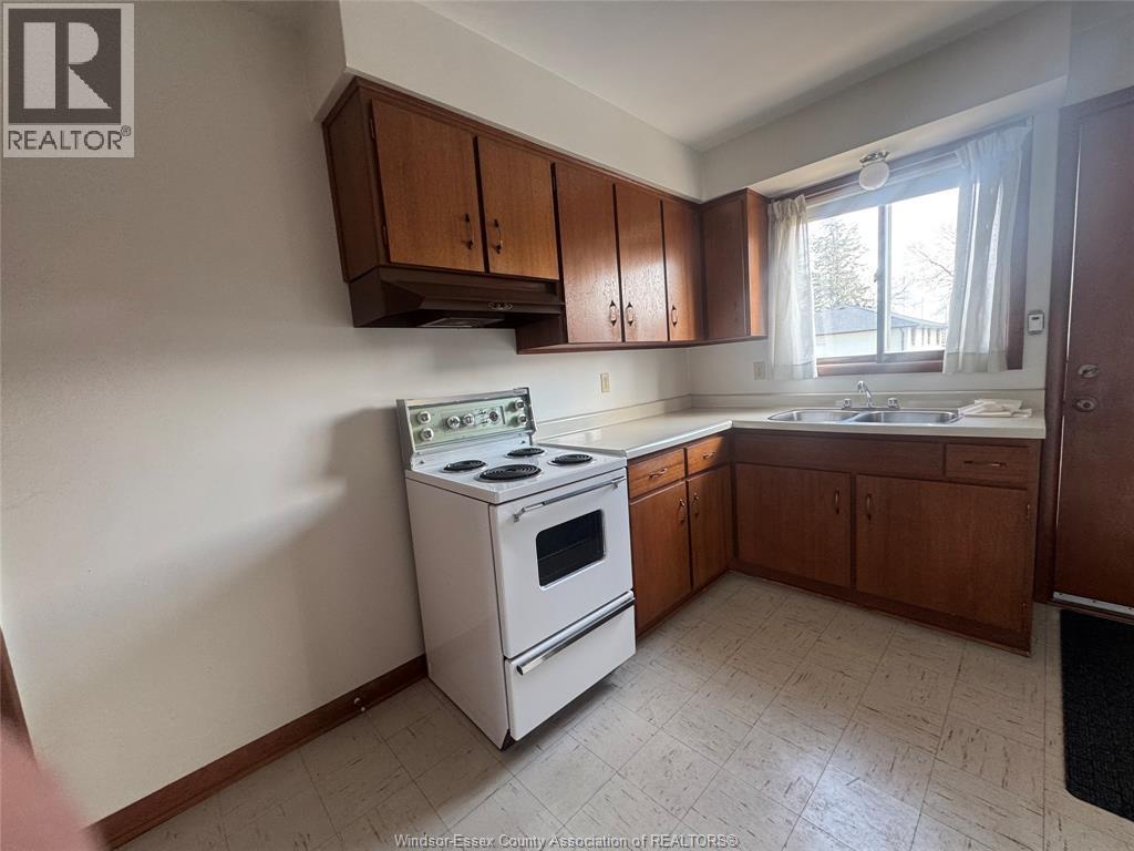 3027 Walker Road Unit# B, Windsor, ON - Indoor Photo Showing Kitchen With Double Sink