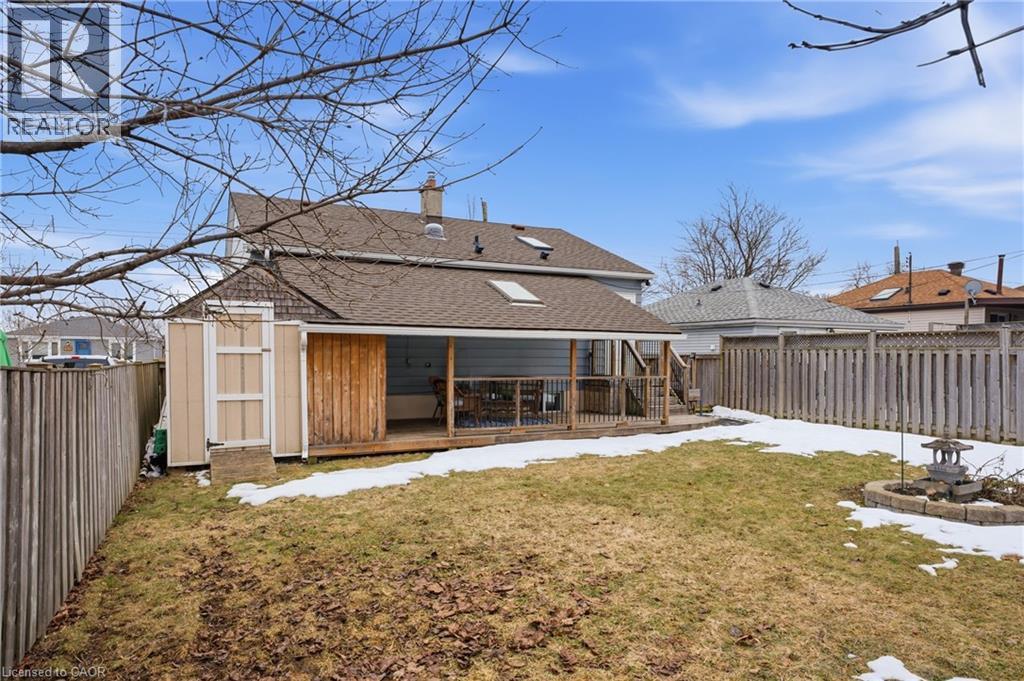 Imagine the fun! Fully fenced rear yard, private play zone for the kids and a park down the street! - 208 East 44Th Street, Hamilton, ON - Outdoor With Deck Patio Veranda