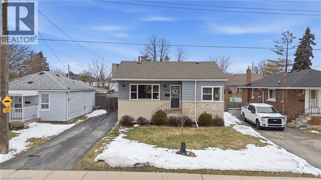 Don't judge this book by its cover! Get inside this bungalow & FAST! Interior has been redone & will impress! - 208 East 44Th Street, Hamilton, ON - Outdoor