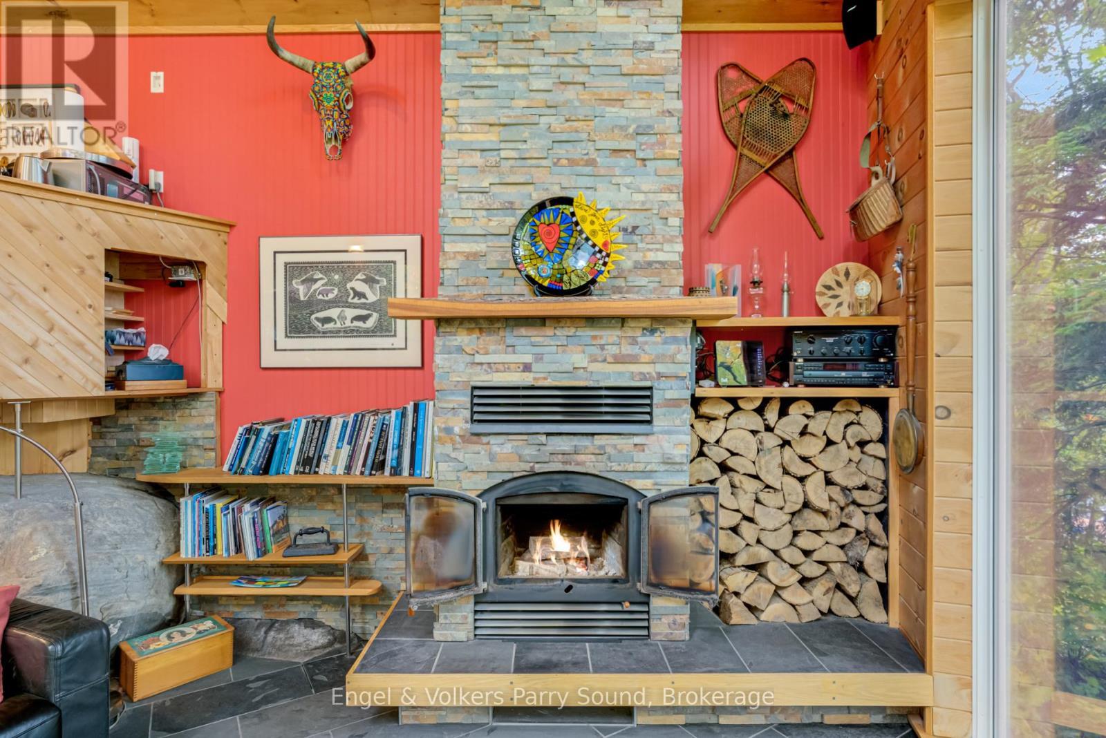 139 Manitou Drive, Mckellar, ON - Indoor With Fireplace