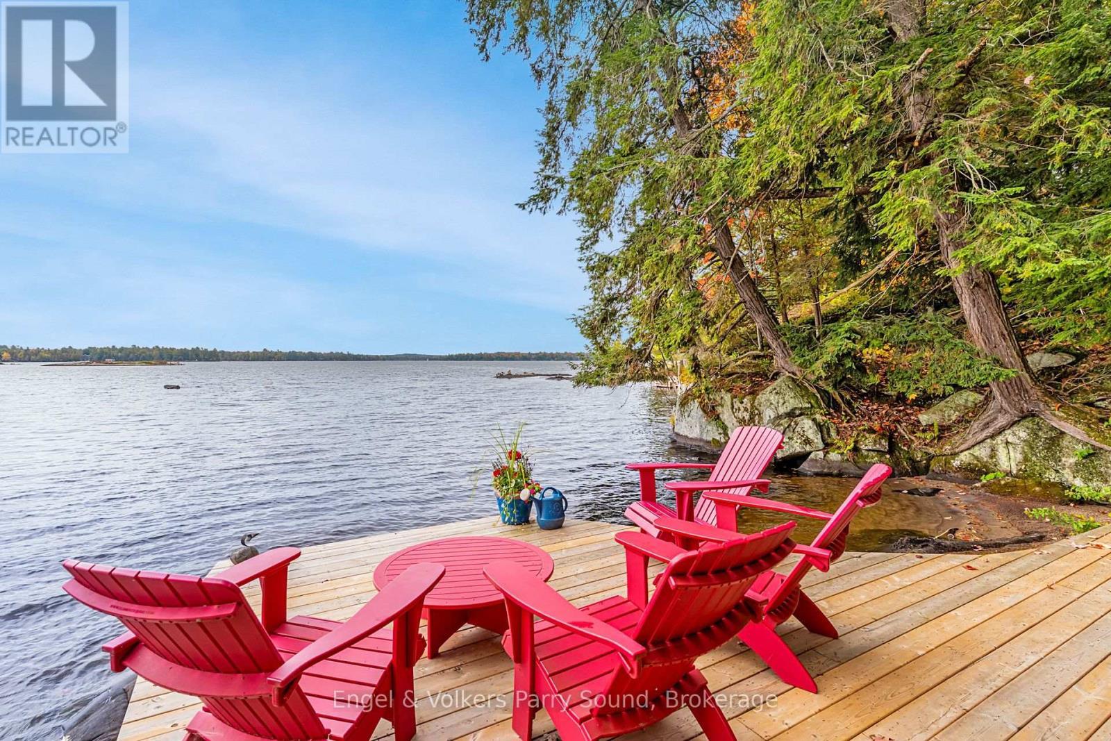 139 Manitou Drive, Mckellar, ON - Outdoor With Body Of Water With Deck Patio Veranda With View