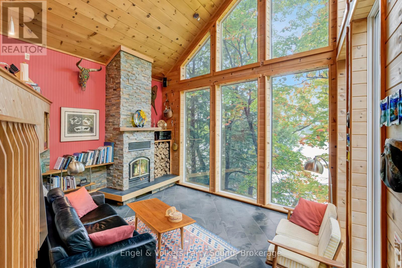 139 Manitou Drive, Mckellar, ON - Indoor With Fireplace