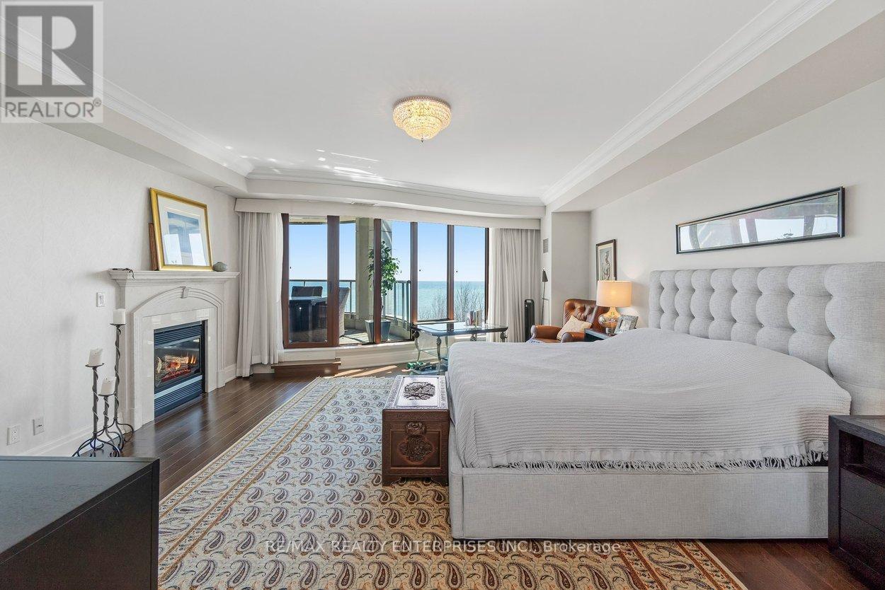 416 - 2095 Lake Shore Boulevard W, Toronto, ON - Indoor Photo Showing Bedroom With Fireplace