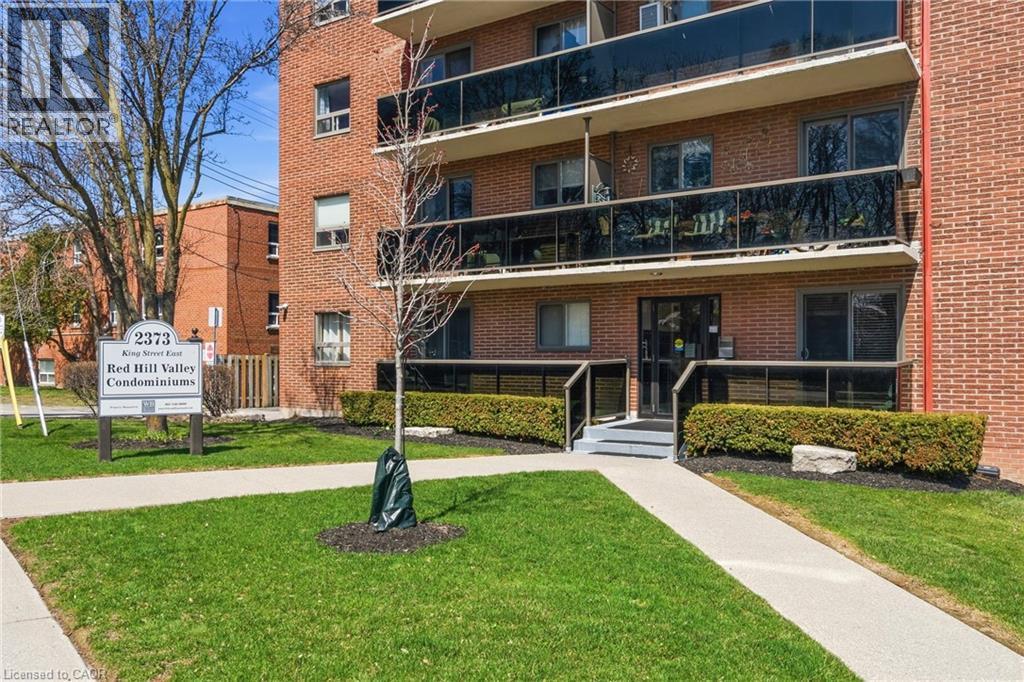 View of front condominium building / complex - 2373 E King Street E Unit# 45, Hamilton, ON - Outdoor With Balcony