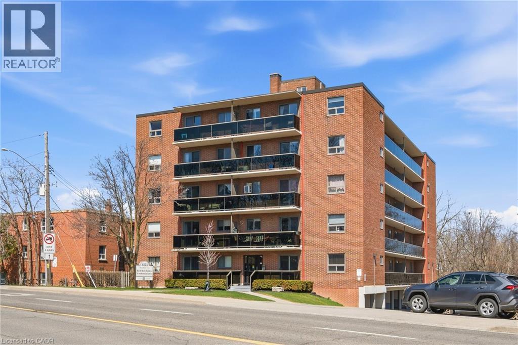 View of condominium building / complex - 2373 E King Street E Unit# 45, Hamilton, ON - Outdoor With Balcony With Facade