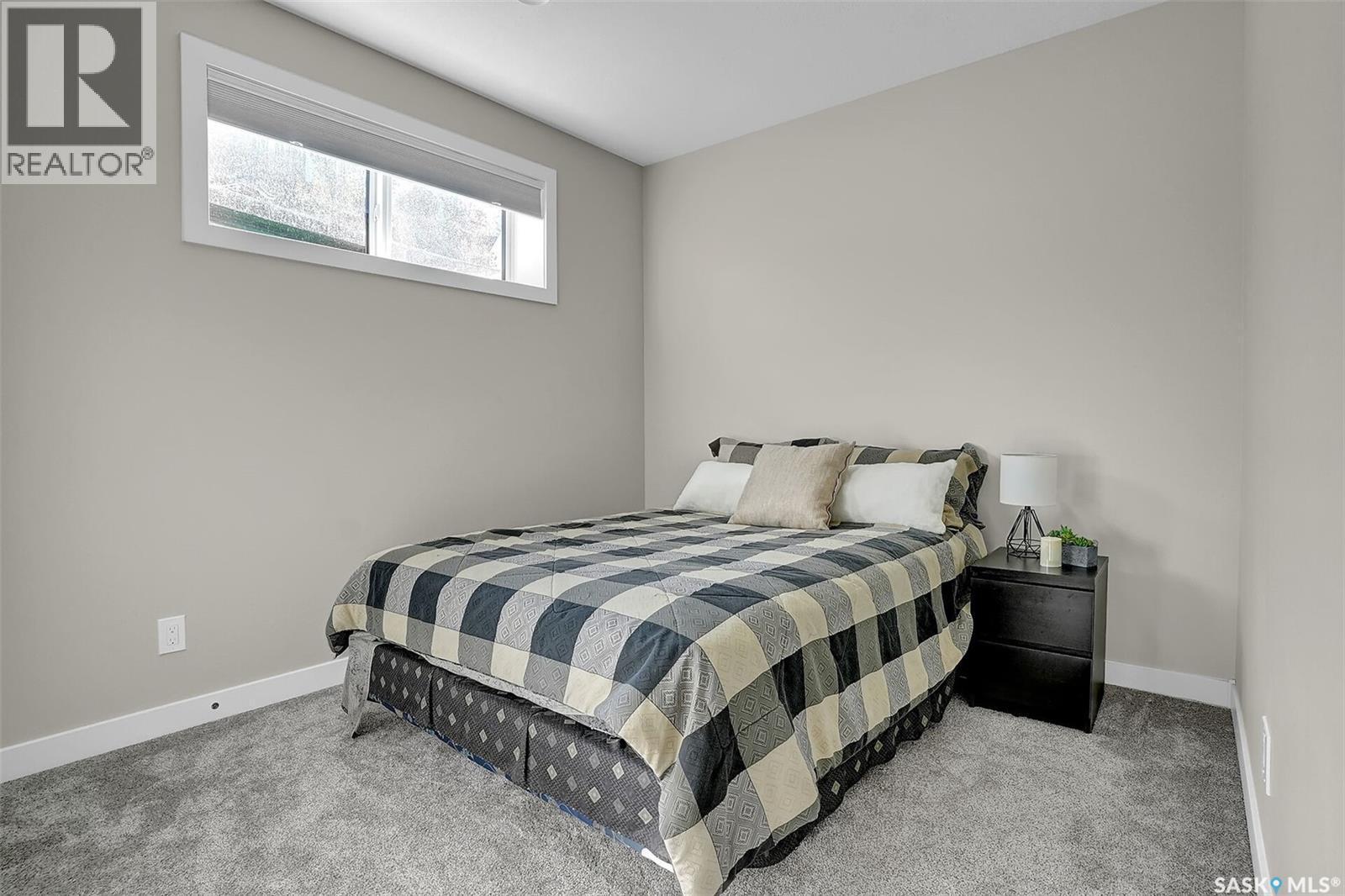 4244 Elderberry Crescent E, Regina, SK - Indoor Photo Showing Bedroom