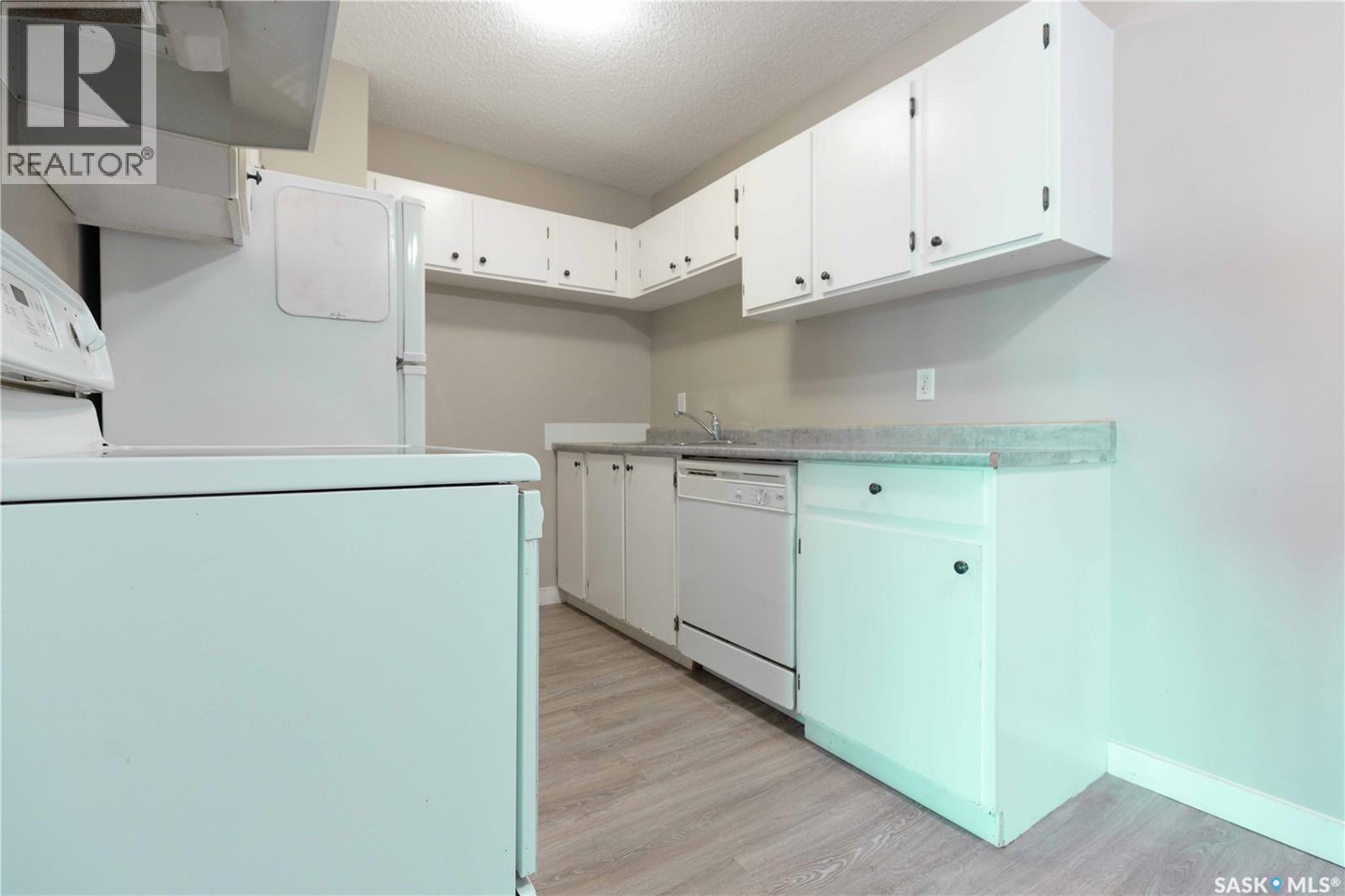 310 311 Tait Crescent, Saskatoon, SK - Indoor Photo Showing Laundry Room