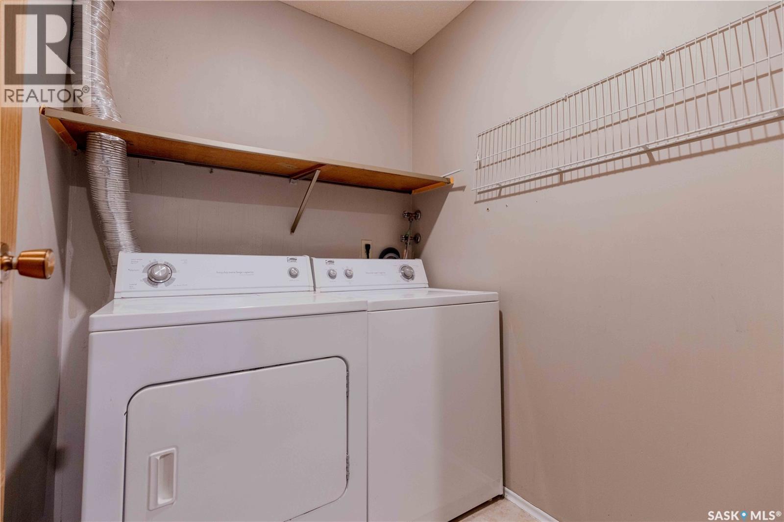 310 311 Tait Crescent, Saskatoon, SK - Indoor Photo Showing Laundry Room