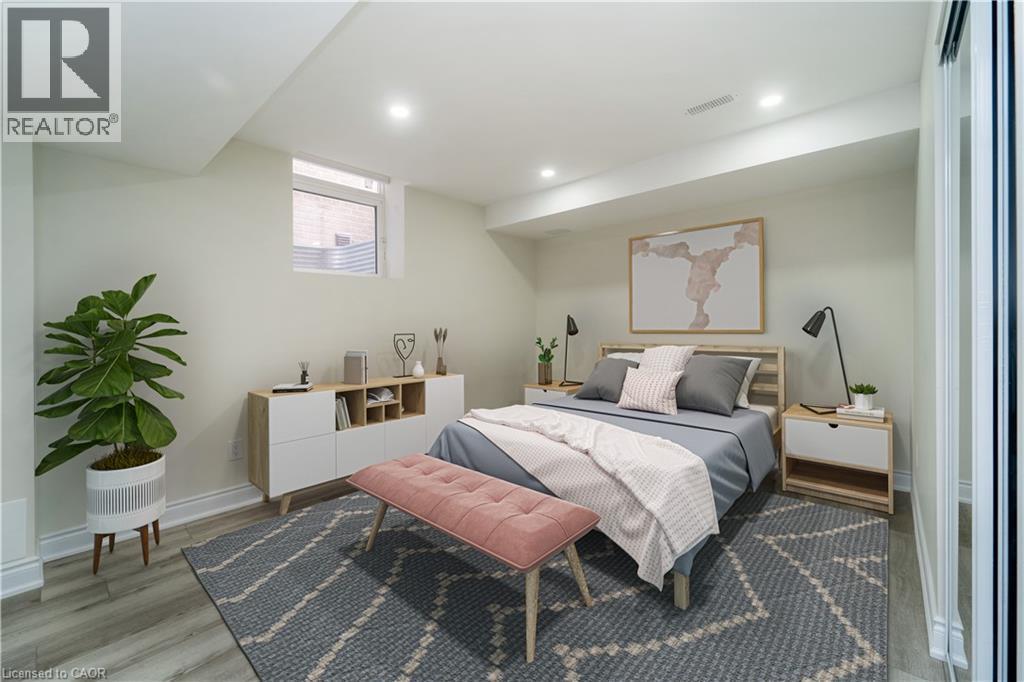 Bedroom featuring wood finished floors and recessed lighting - 150 Goodwin Crescent Unit# Bsmt, Milton, ON - Indoor Photo Showing Bedroom