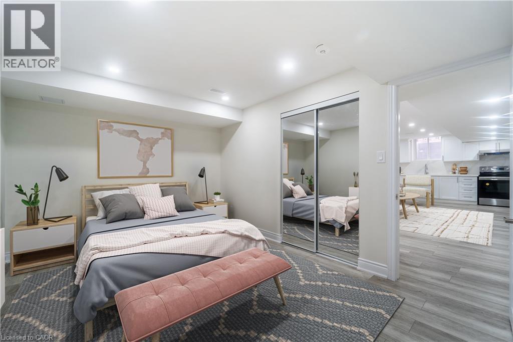Bedroom with a closet, wood finished floors, and recessed lighting - 150 Goodwin Crescent Unit# Bsmt, Milton, ON - Indoor Photo Showing Bedroom