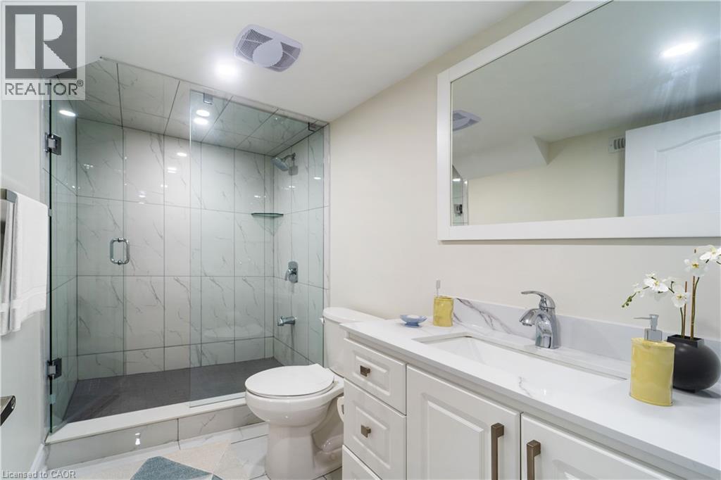 Bathroom with vanity and a marble finish shower - 150 Goodwin Crescent Unit# Bsmt, Milton, ON - Indoor Photo Showing Bathroom