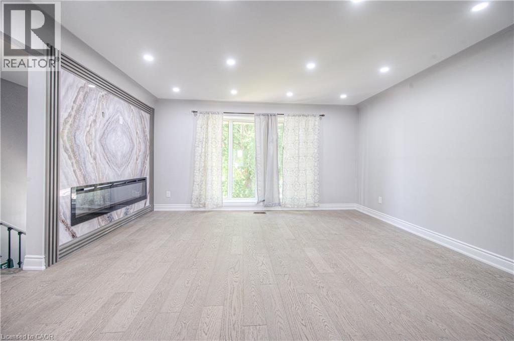 279 Dixon Street, Kitchener, ON - Indoor Photo Showing Other Room With Fireplace