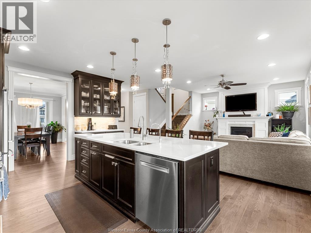 65 Augustus, Lasalle, ON - Indoor Photo Showing Kitchen With Fireplace With Double Sink With Upgraded Kitchen