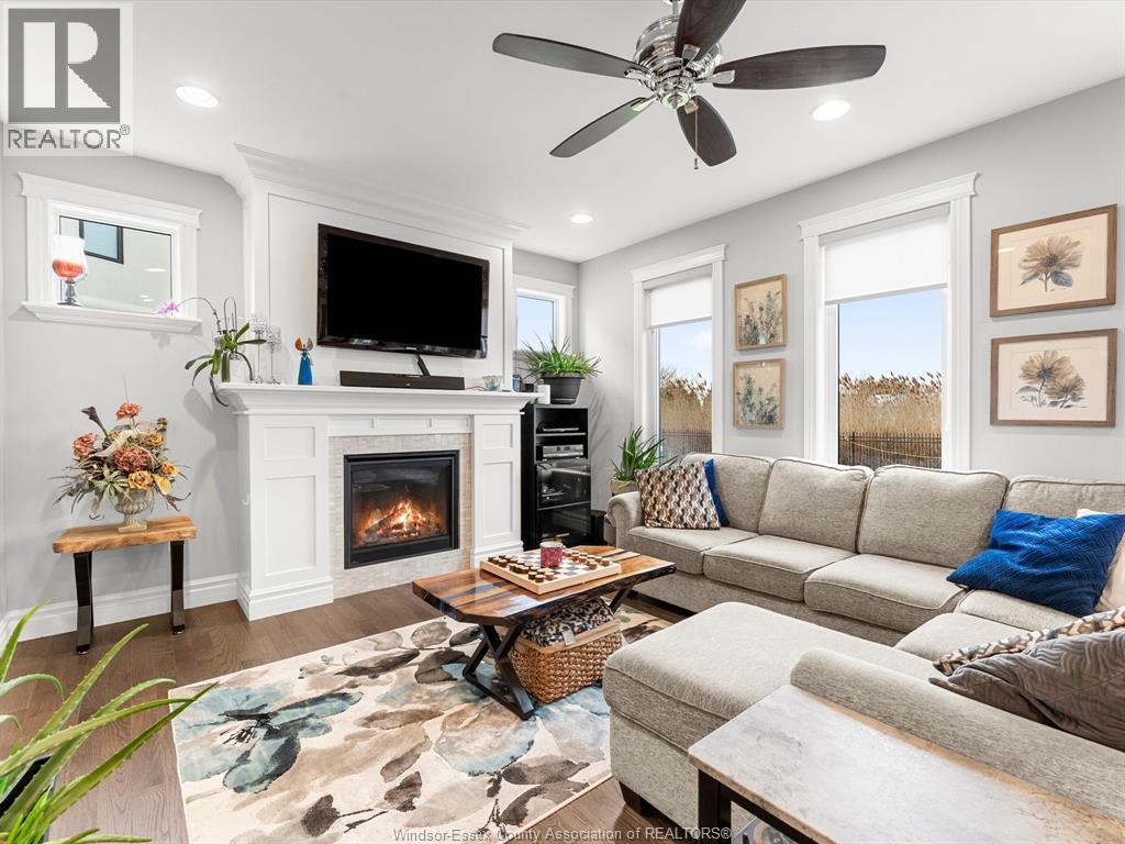 65 Augustus, Lasalle, ON - Indoor Photo Showing Living Room With Fireplace