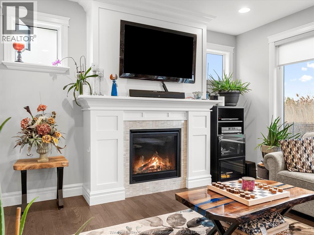 65 Augustus, Lasalle, ON - Indoor Photo Showing Living Room With Fireplace