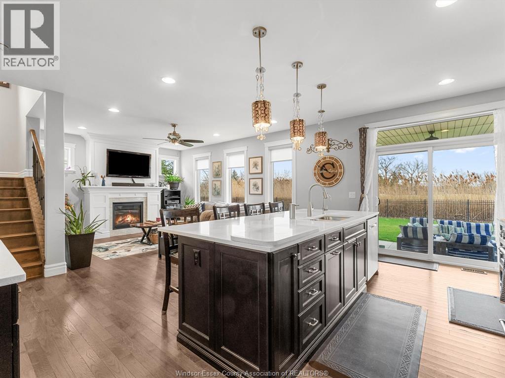 65 Augustus, Lasalle, ON - Indoor Photo Showing Kitchen With Fireplace With Upgraded Kitchen