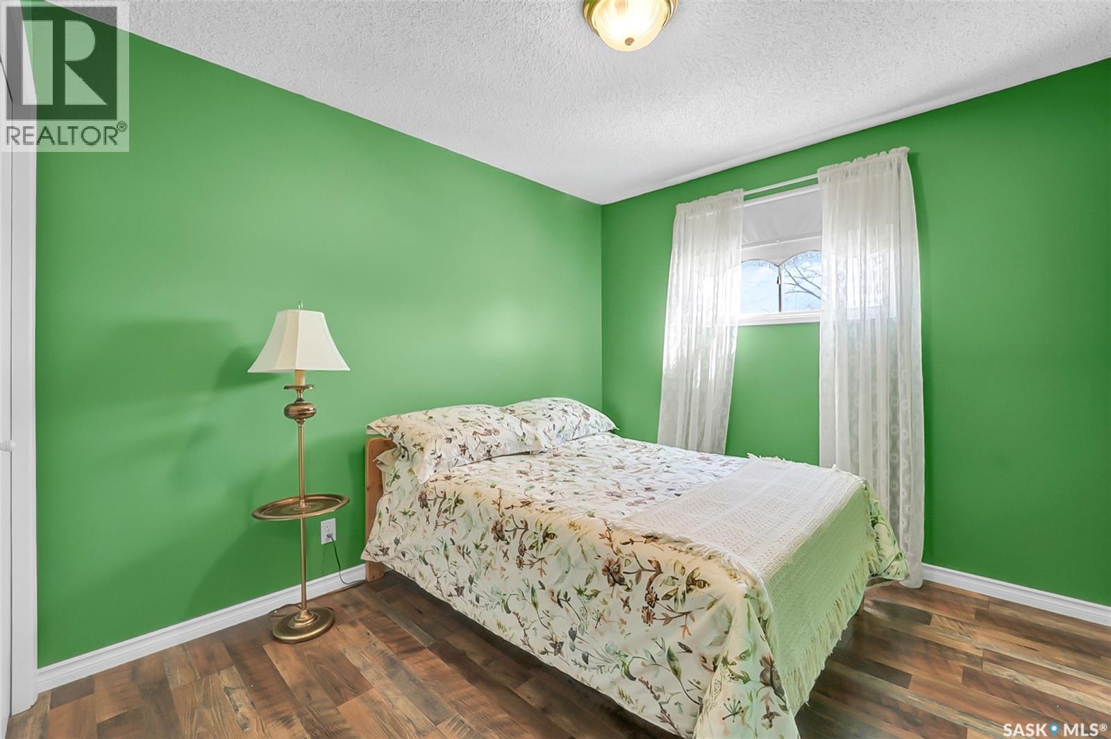 703 Candle Court, Saskatoon, SK - Indoor Photo Showing Bedroom