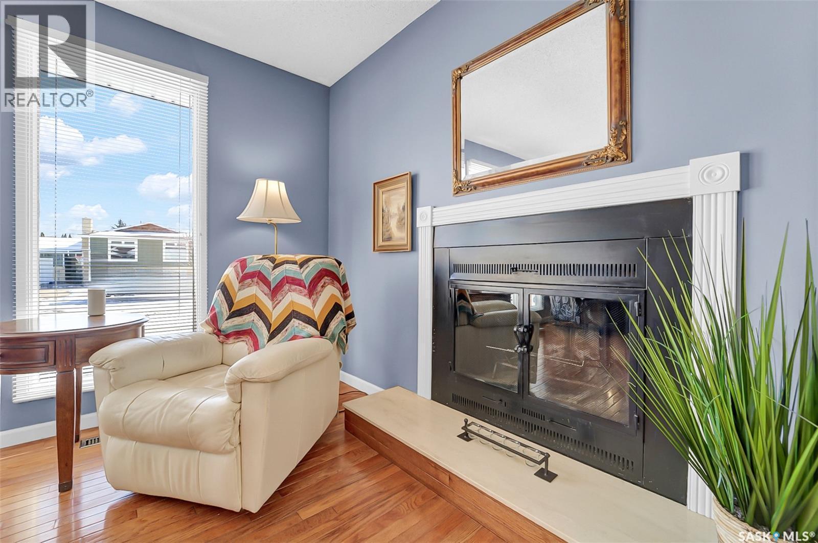 703 Candle Court, Saskatoon, SK - Indoor Photo Showing Living Room With Fireplace
