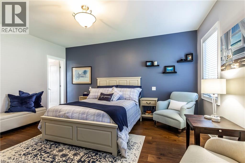 Bedroom with wood finished floors - 72 Pond View Gate, Waterdown, ON - Indoor Photo Showing Bedroom