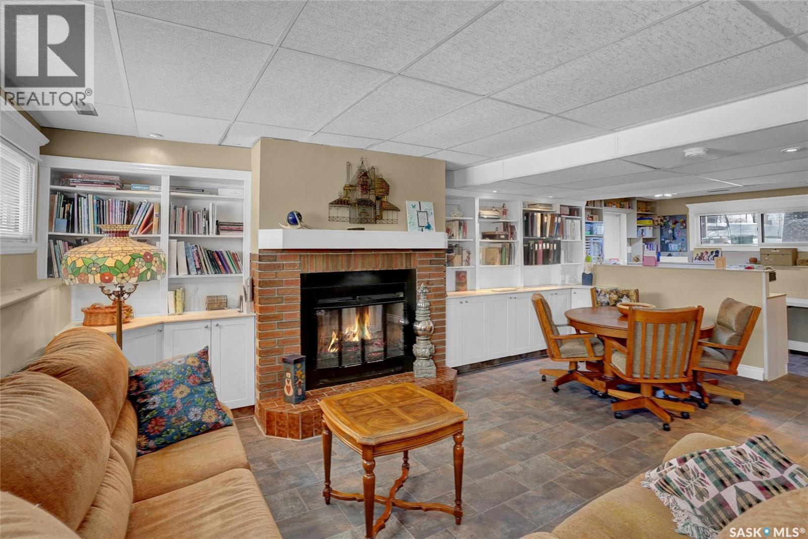 102 Daisy Crescent, Moose Jaw, SK - Indoor Photo Showing Living Room With Fireplace