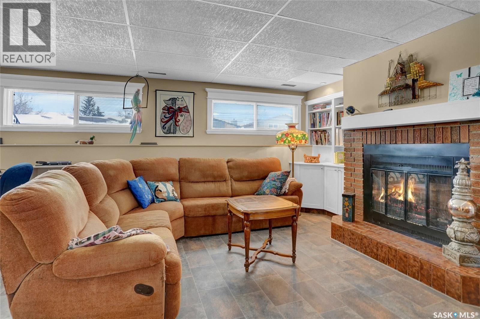 102 Daisy Crescent, Moose Jaw, SK - Indoor Photo Showing Living Room With Fireplace