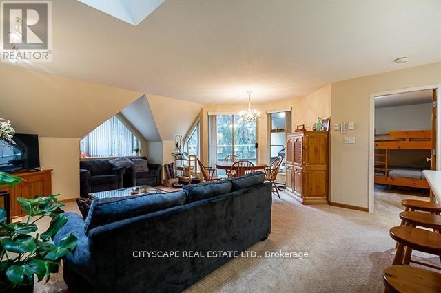 31 - 4636 Blackcomb Way, Bc, BC - Indoor Photo Showing Living Room