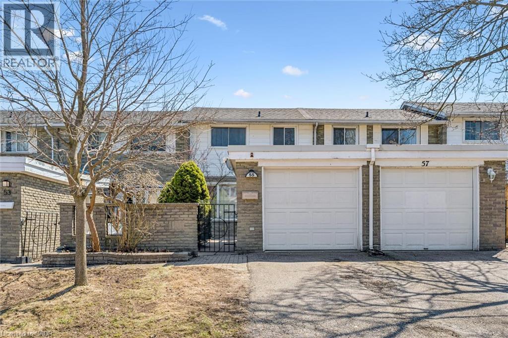 Traditional-style house featuring asphalt driveway and a gate - 55 Ralgreen Crescent, Kitchener, ON - Outdoor