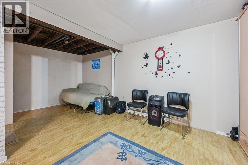 Bedroom with light wood-type flooring - 55 Ralgreen Crescent, Kitchener, ON - Indoor