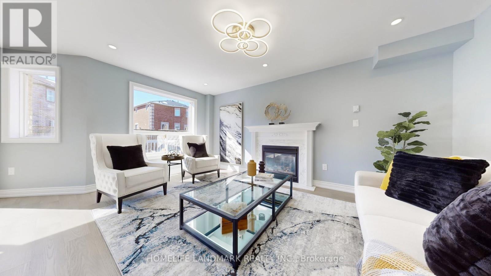 75 Ambler Bay, Barrie, ON - Indoor Photo Showing Living Room With Fireplace