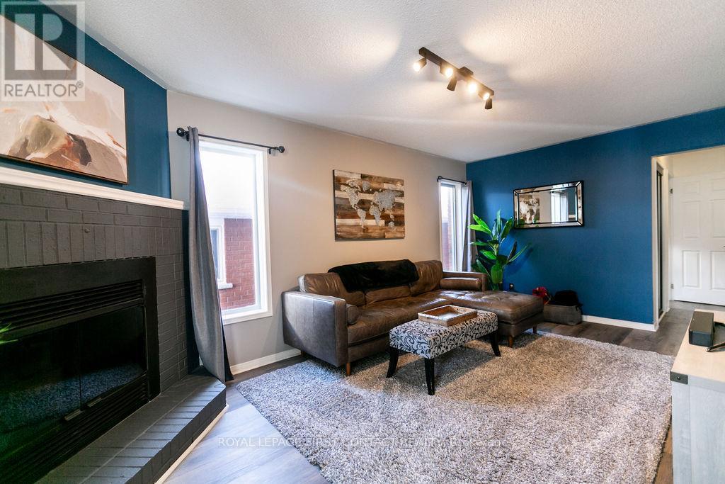 13 Irwin Drive, Barrie, ON - Indoor Photo Showing Living Room With Fireplace