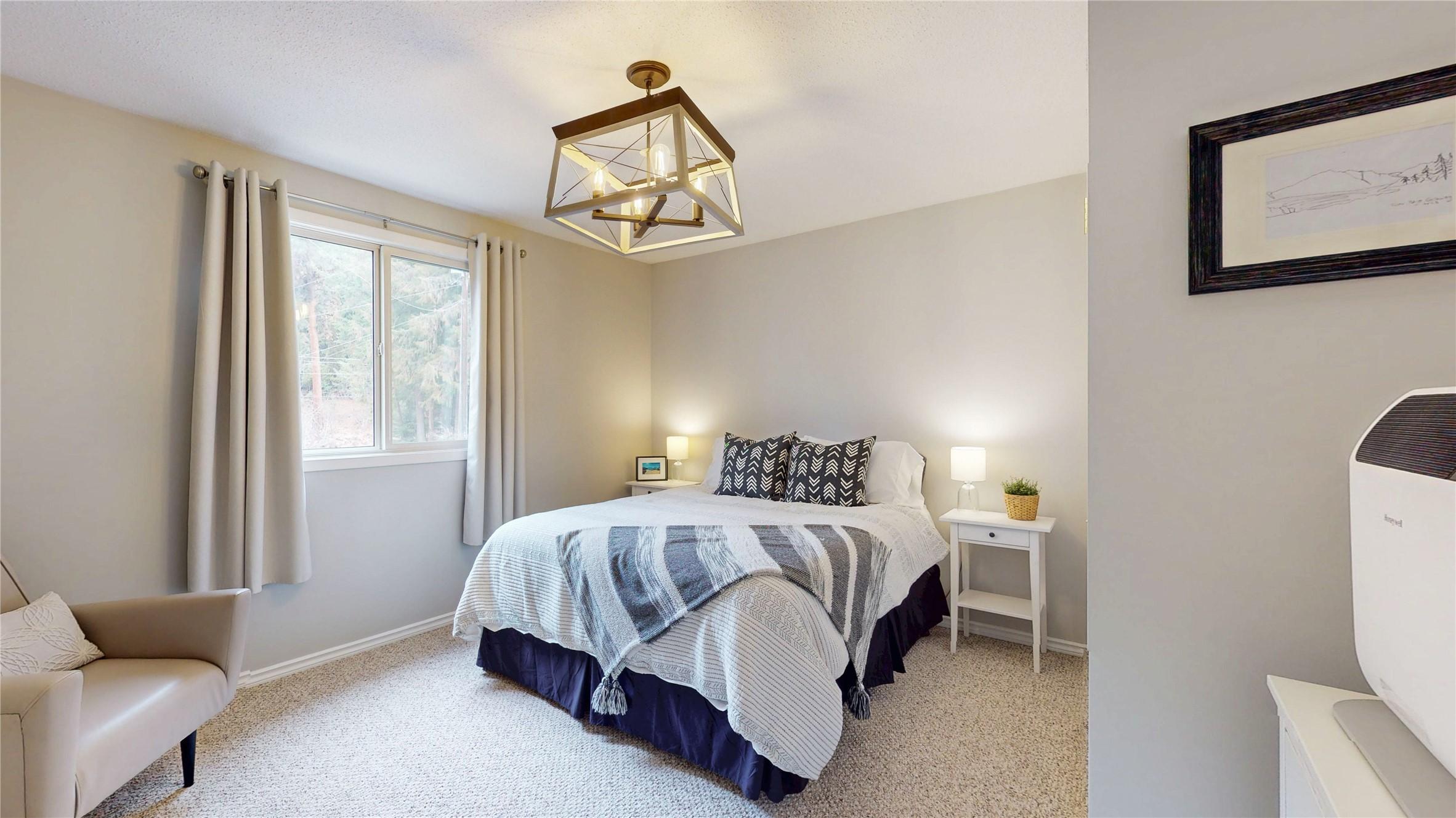10219 Twin Bays Road, Twin Bays, BC - Indoor Photo Showing Bedroom