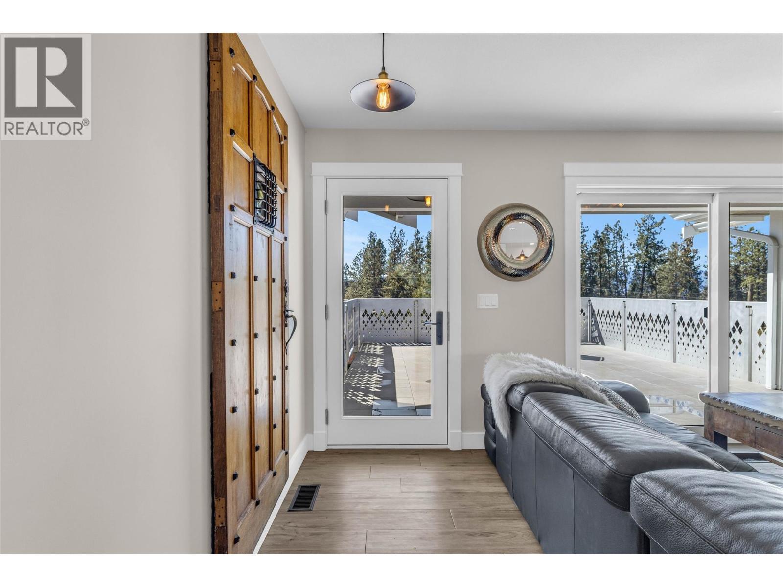 Main entrance into Open plan great room - 488 Sheila Crescent, Kelowna, BC - Indoor