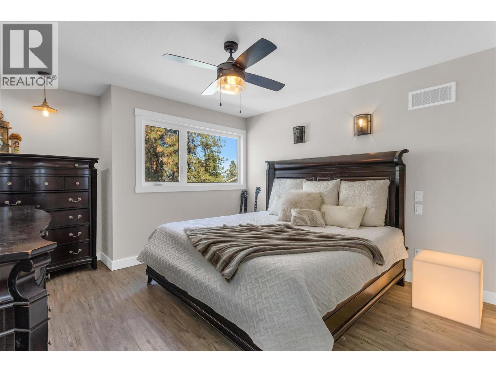 Primary King Size bedroom - 488 Sheila Crescent, Kelowna, BC - Indoor Photo Showing Bedroom