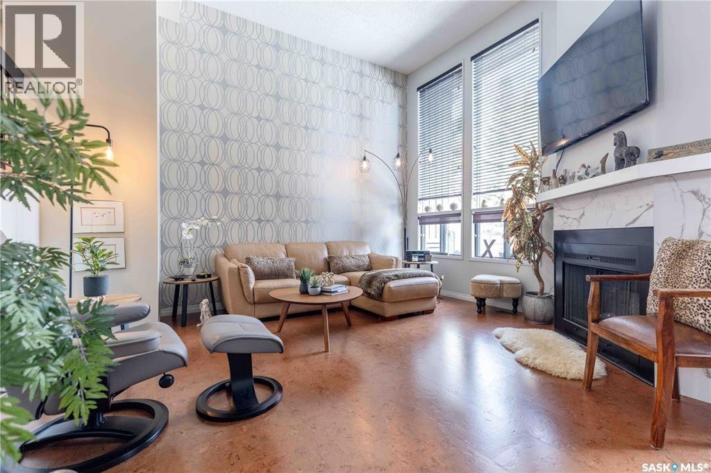 52 455 Pinehouse Drive, Saskatoon, SK - Indoor Photo Showing Living Room With Fireplace