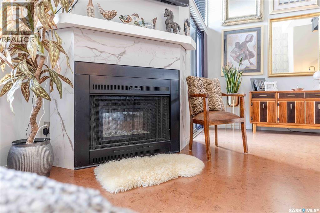 52 455 Pinehouse Drive, Saskatoon, SK - Indoor Photo Showing Living Room With Fireplace